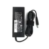 Dell 90W Adapter Charging a Laptop